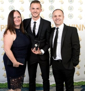 Una Maddison with her husband and son.